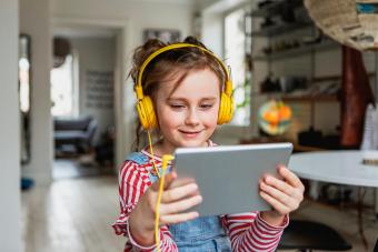 Girl using digital tablet