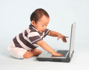 Toddler Using a Laptop