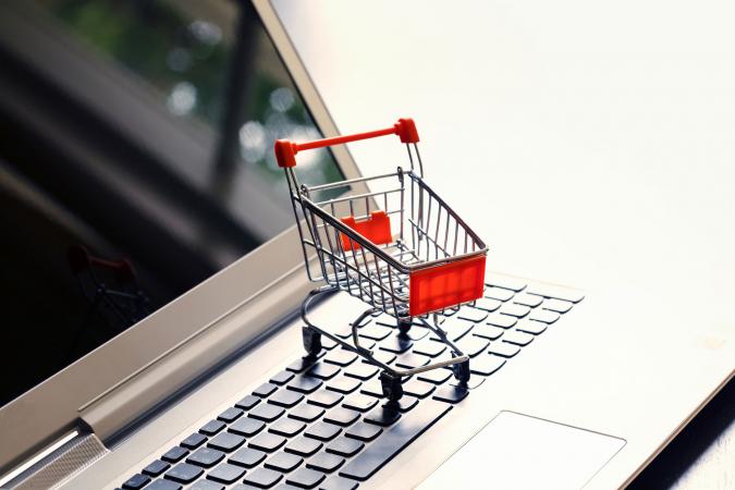 shopping cart on a computer keyboard