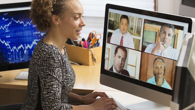 Businesswoman teleconferencing from home
