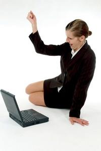 Businesswoman winning online auction