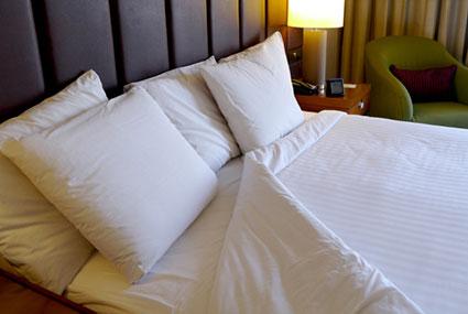 organic cotton sheets on bed