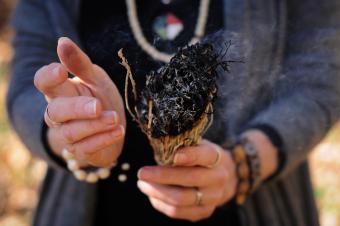 Woman burning sage