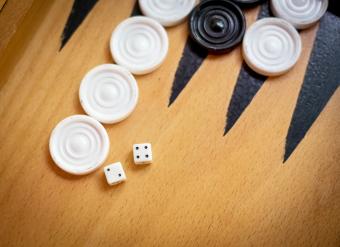 Wooden Backgammon board with slots and dice