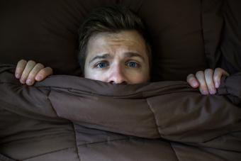 Man experiencing sleep disturbances