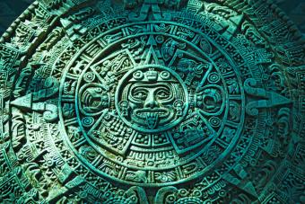 Green Aztec calendar stone carving