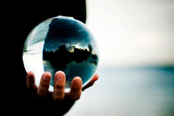 Glass ball on hand