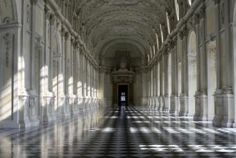 Corridor with columns and checkered floor