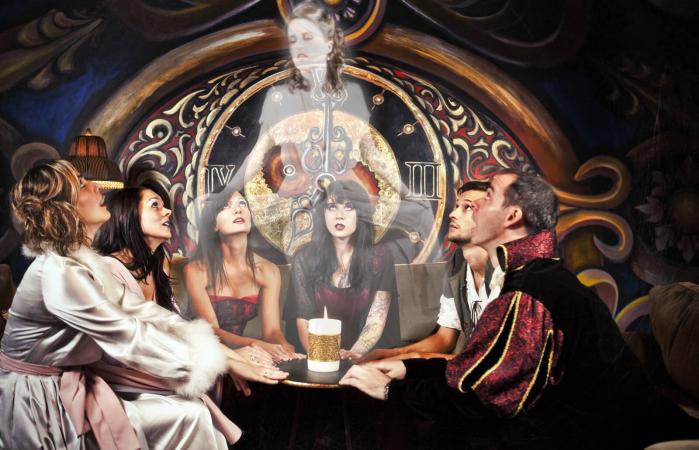 Group of People Having a Seance