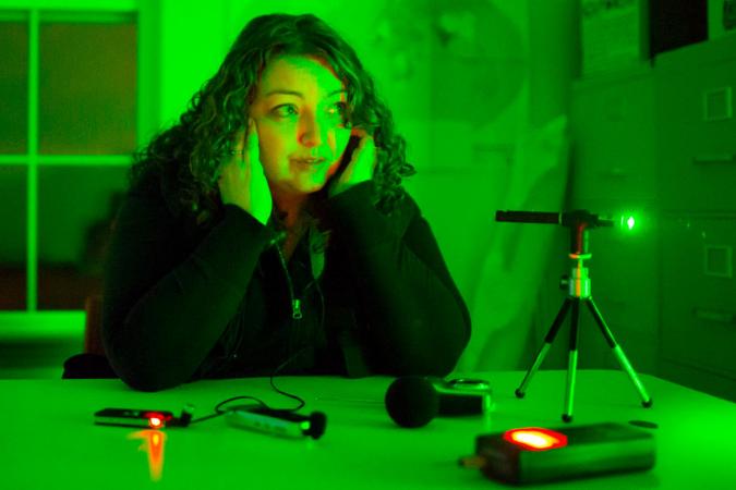 Jeni Dyer listens to device