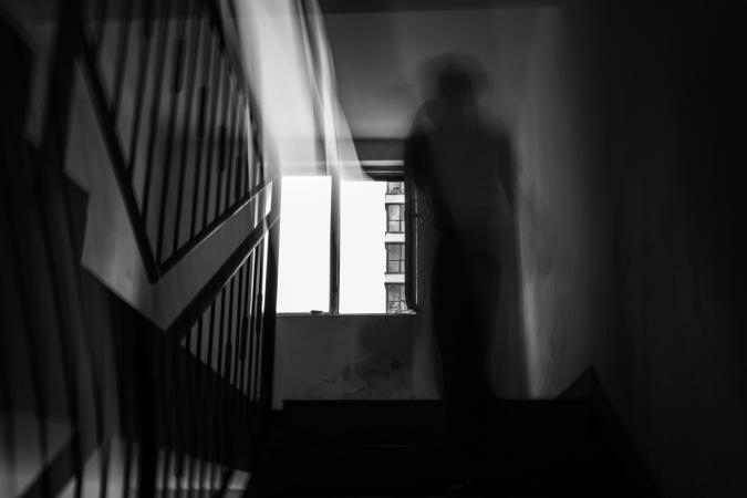 Ghostly figure on stairs