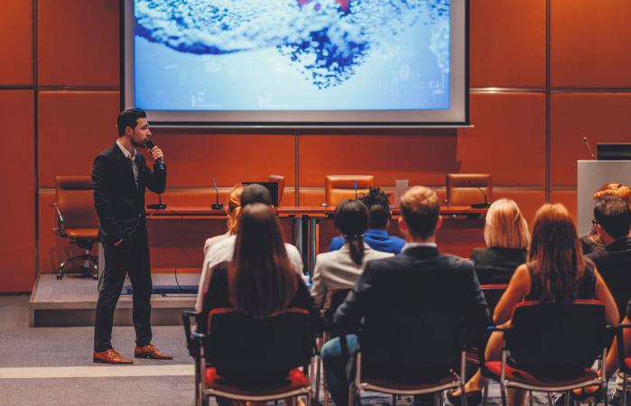 Public speaker at medium convention