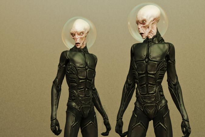 Two aliens in black spacesuits