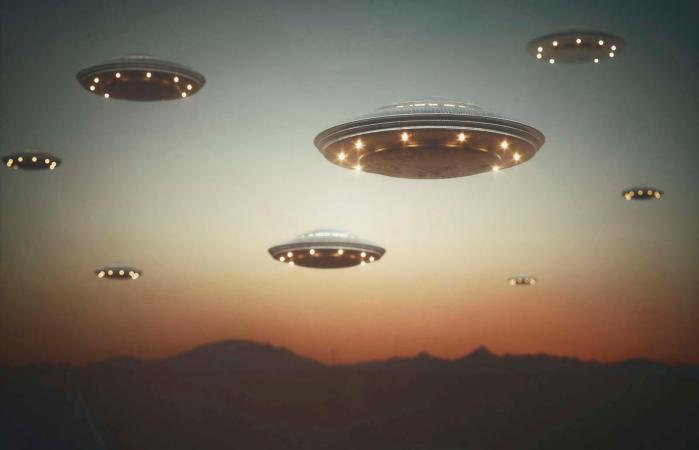 Invasion of alien spaceships at sunset