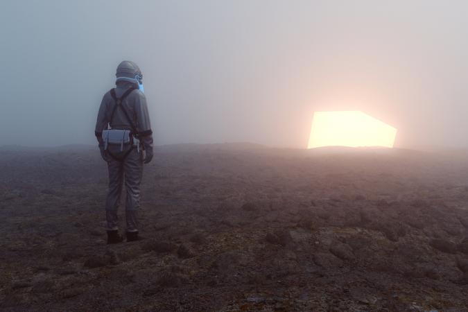 Astronaut and glowing alien cube