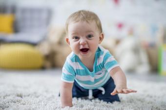 baby boy learning to crawl