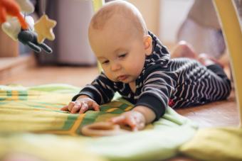 Baby playing on floor