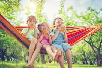 kids relaxing in hammock 