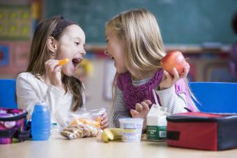 Students eating lunch in classroom