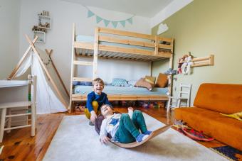 Two little boys playing in their room