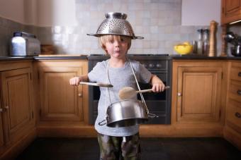 https://cf.ltkcdn.net/parenting/toddlers/images/std-xs/344159-340x227-toddler-playing-kitchen.jpg