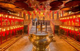 praying inside the Man Mo temple