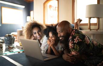 Happy family playing online games