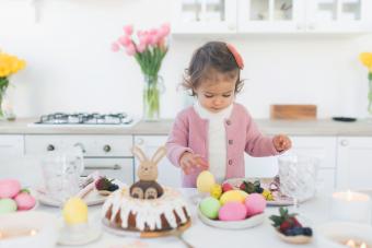 Beautiful cute little baby girl celebrating Easter at home