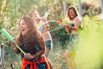 teenagers water gun fight