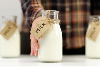 Woman offering milk