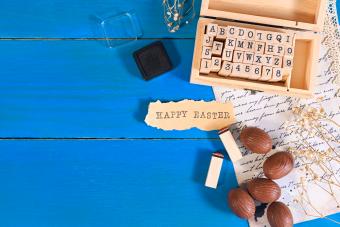 Chocolate eggs, letters for a stamp, an inscription happy easter