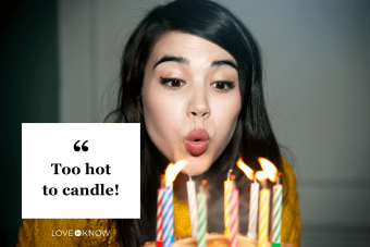 woman blowing out birthday candles