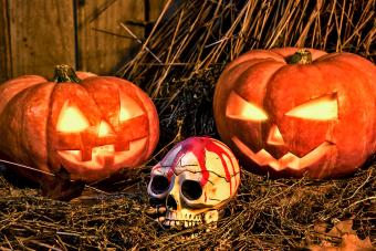 spooky bloody red skull and orange pumpkins decoration for Halloween