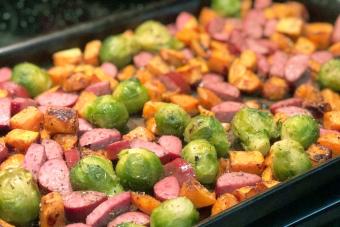 Large sheet pan with smoked sausage, Brussel sprouts and sweet potatoes