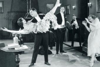 Wild Party With Woman Flapper Turned Upside-Down