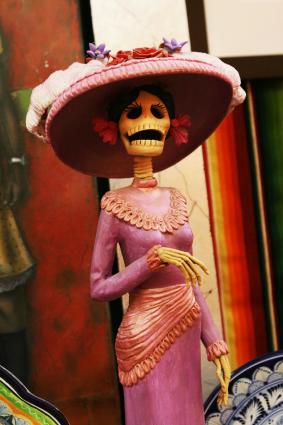 Calacas are whimsical figures prominently featured in Day of the Dead celebrations.