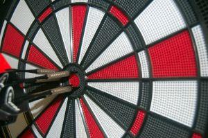 Games like pool and darts can liven up a graduation party.