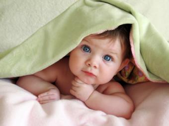 baby under blanket