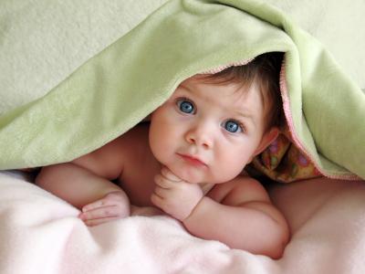 baby under blanket