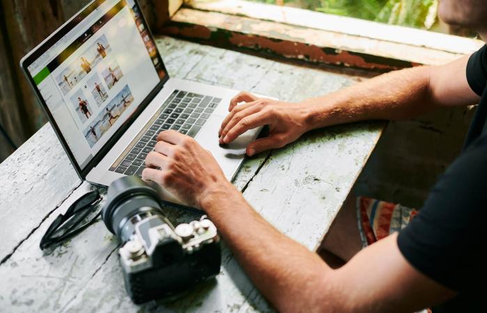 Photographer on laptop