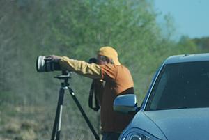 Photojournalist at work.