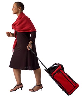 Woman pulling luggage