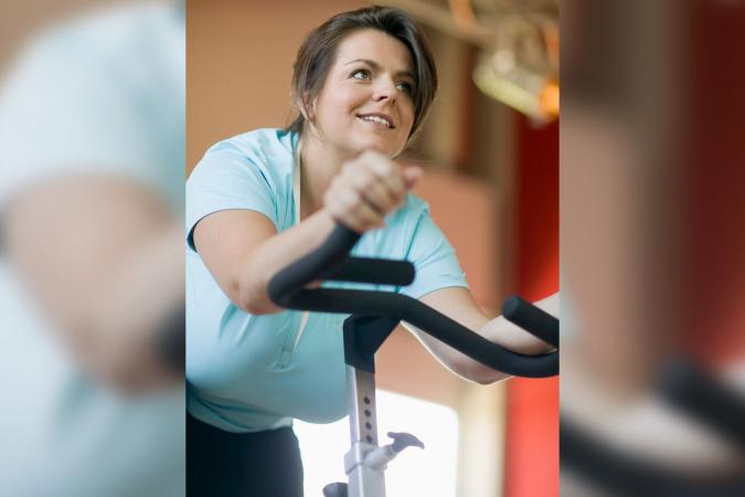 Woman on exercise bike