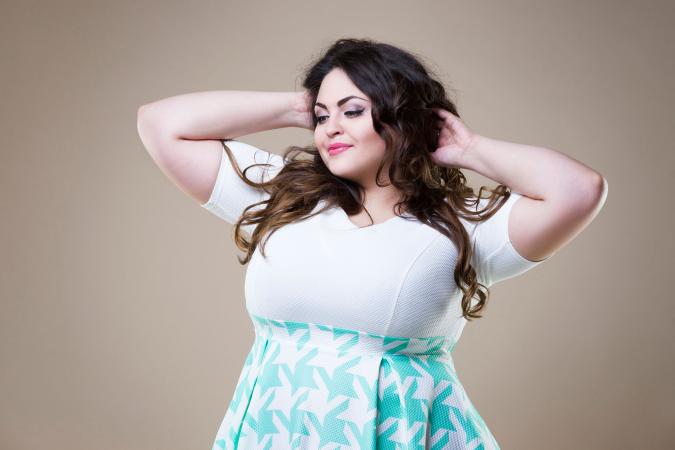 Plus size woman wearing dress
