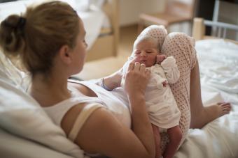 Mother bonding with newborn baby