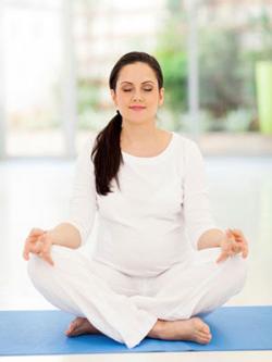 Pregnant woman meditating