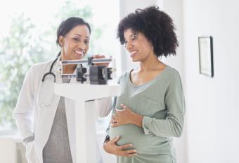 pregnant woman on scale