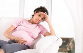 Depressed pregnant woman feeling frustrated