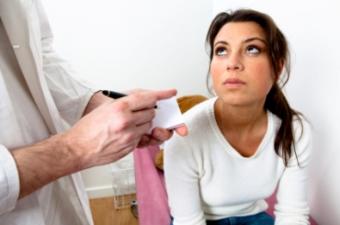 A woman consulting her OB/GYN about menstrual clotting