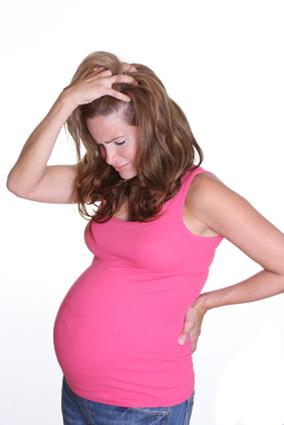 Image of a depressed pregnant woman feeling frustrated